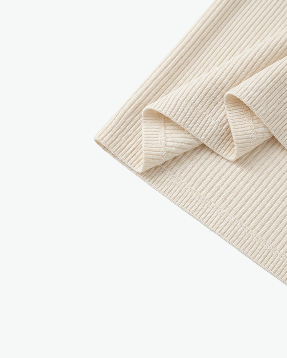 Kingsley & Co cream ribbed-knit zip cardigan, ribbed knit fabric detail