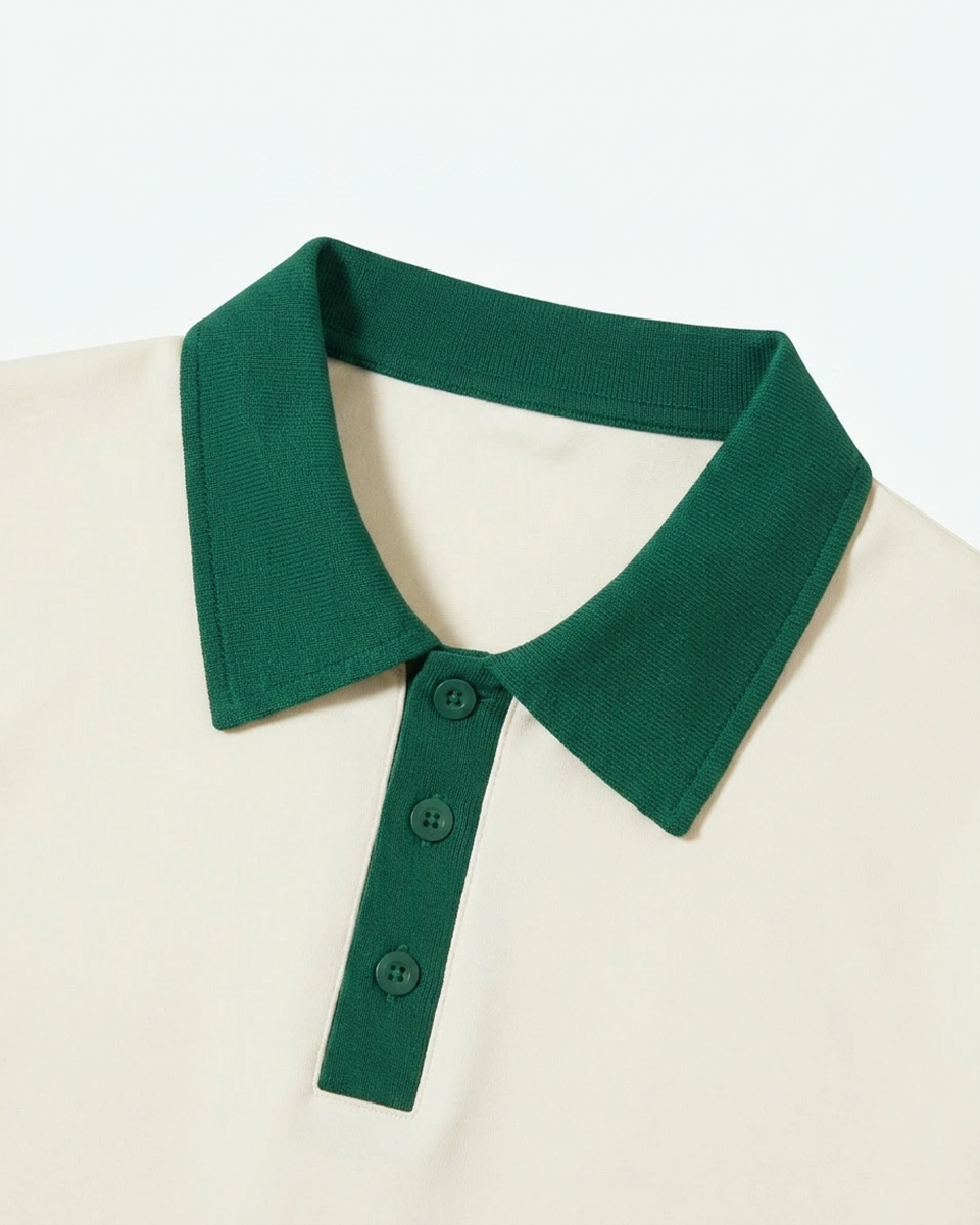 Ivory & green contrast-collar polo, green collar and placket detail