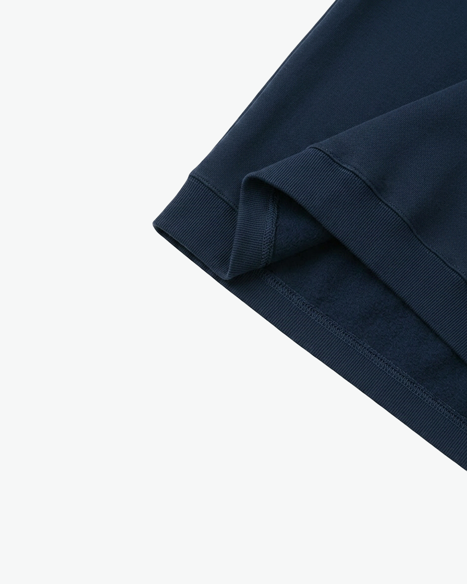 Kingsley & Co navy quarter-zip sweatshirt, hem and fabric detail
