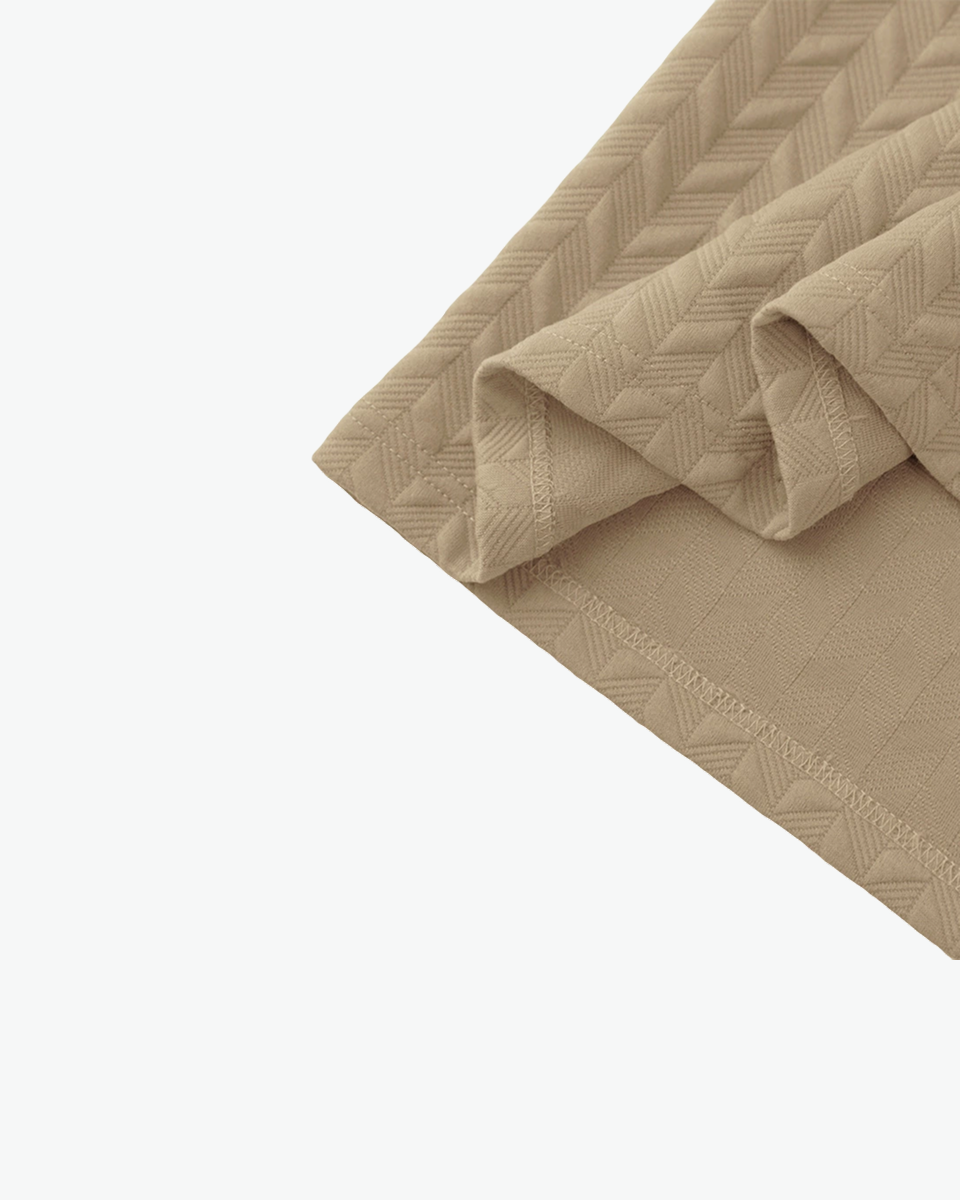 Kingsley & Co sand textured-knit polo shirt, chevron knit fabric detail