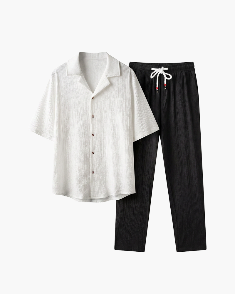 White and black textured-knit shirt and trouser set by Kingsley & Co